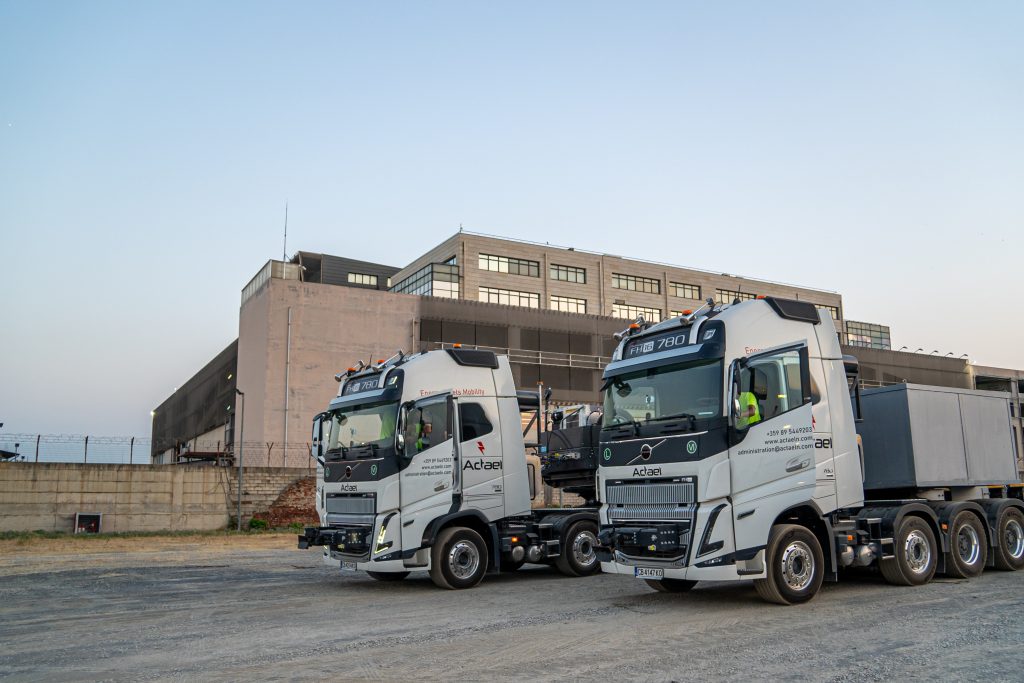Large transformer loaded on flatbed truck for industrial transport