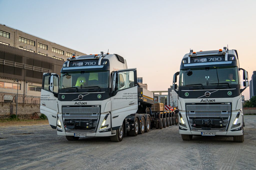 Concrete bridge girder loaded on specialized trailer