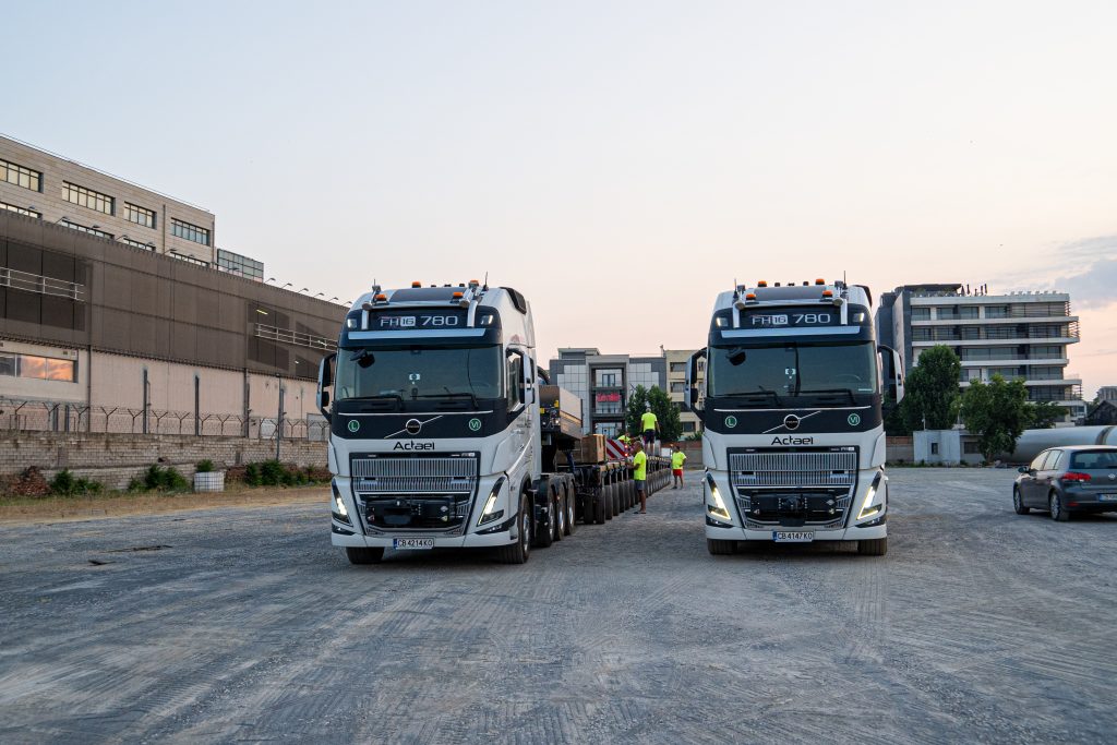 Heavy bulldozer on low-loader trailer in transit