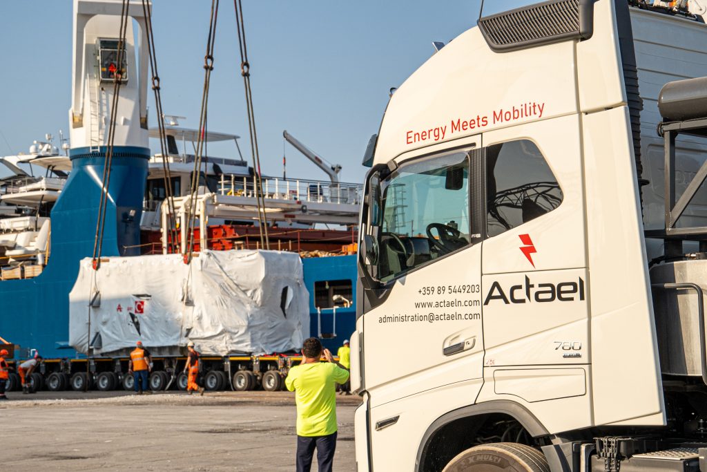 Wind turbine blade being offloaded at site